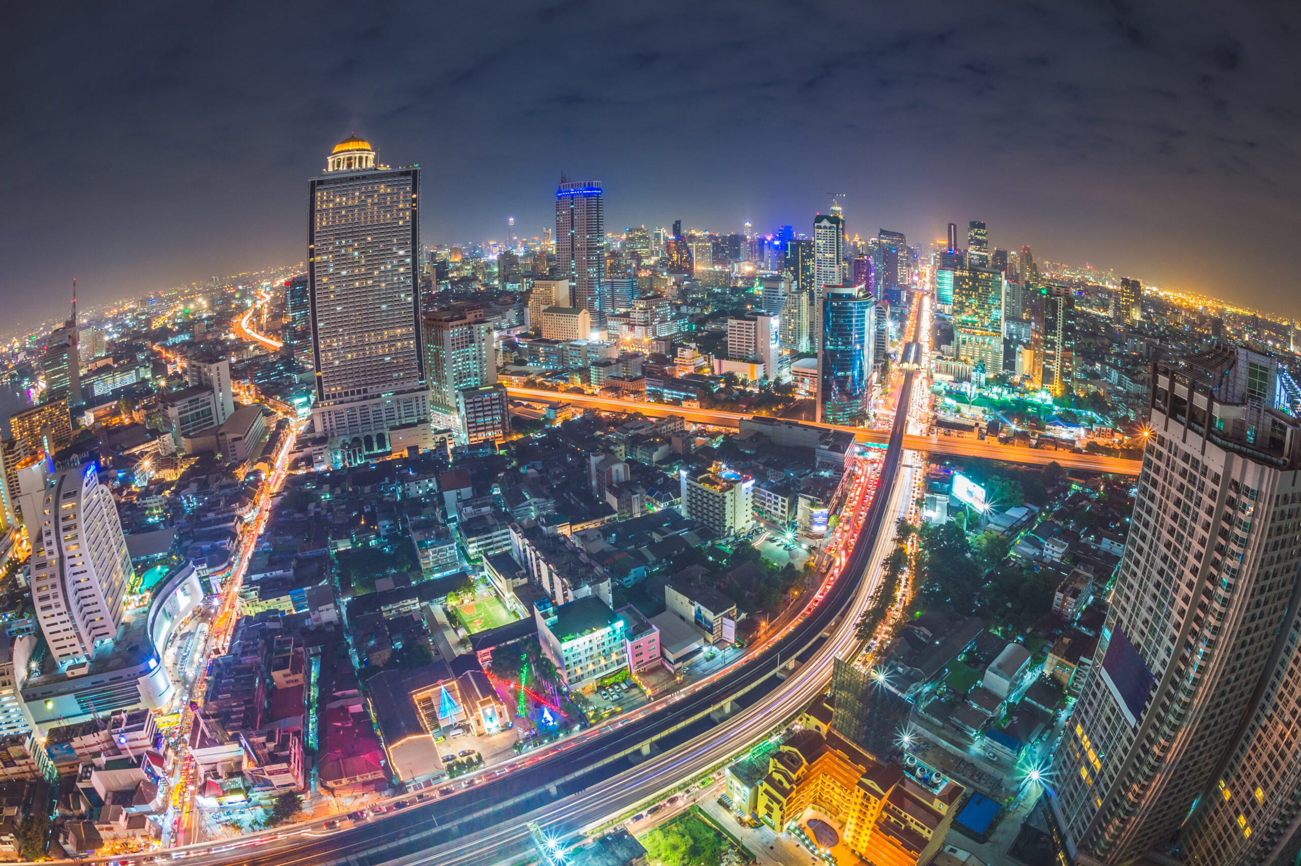 An aerial view of Bangkok at night.